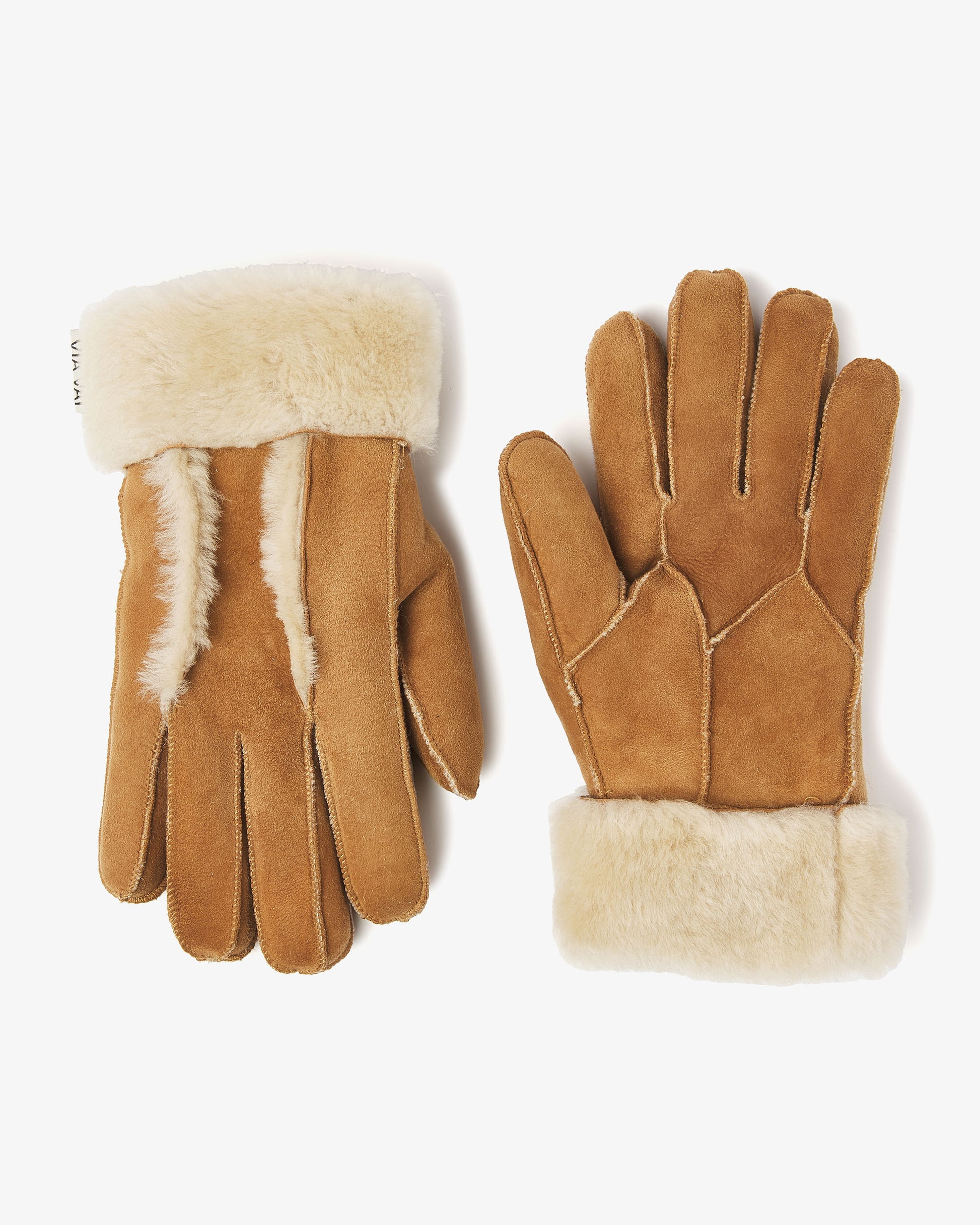 Pair of brown gloves with white fur trim on a white background