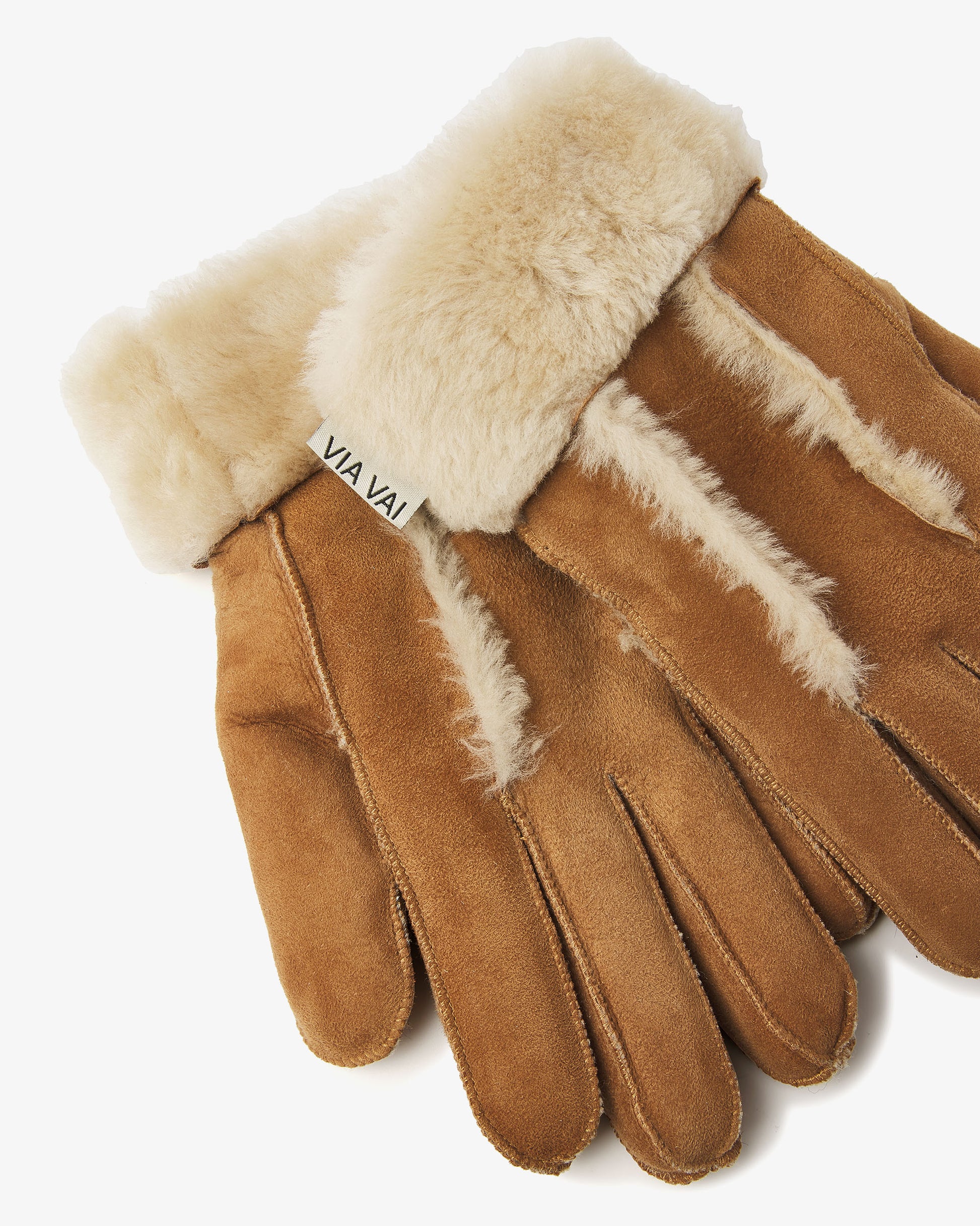 Brown gloves with fur trim on a white background